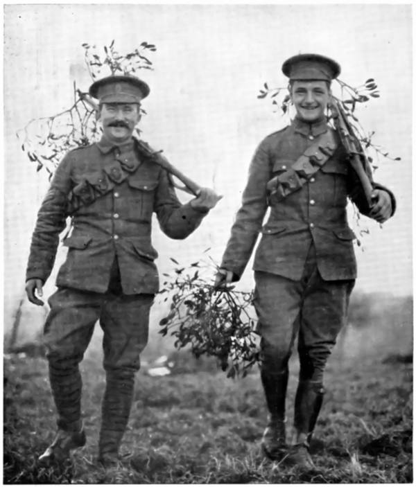 CHRISTMAS AT THE FRONT: BRITISH SOLDIERS BRINGING IN MISTLETOE